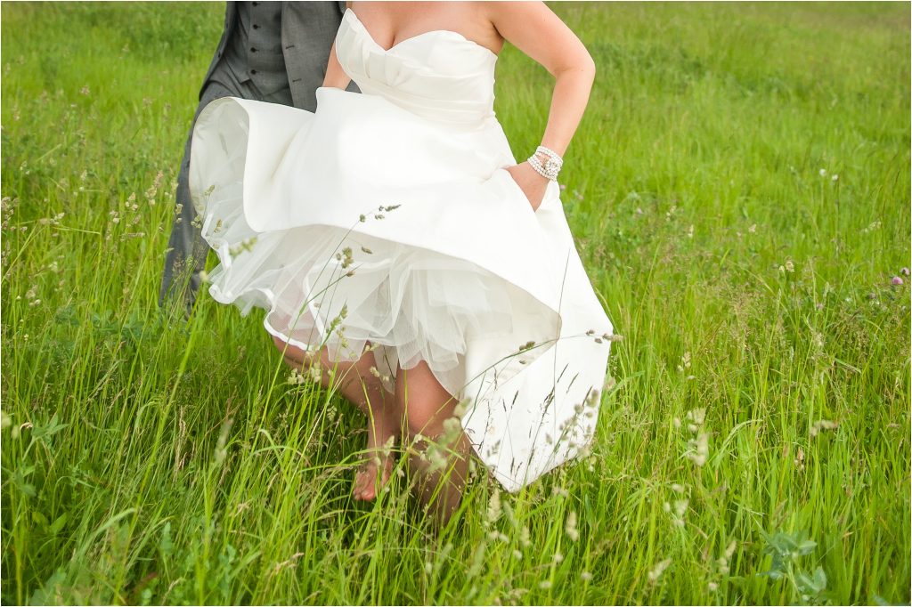 Seneca Lake NY Vineyard Wedding ceremony photos, reception photos, bride and groom portraits with rainbow
