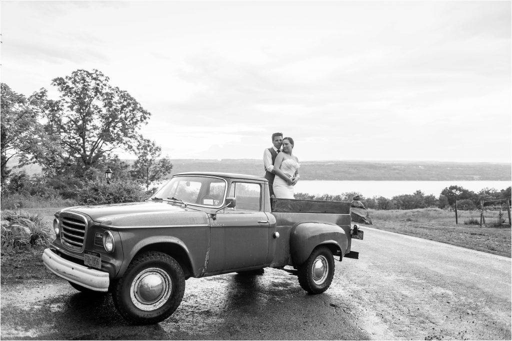 Seneca Lake NY Vineyard Wedding ceremony photos, reception photos, bride and groom portraits with Studebaker truck