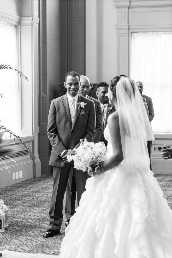 The John Marshall Ballroom groom first look at his bride walking down the aisle Photo