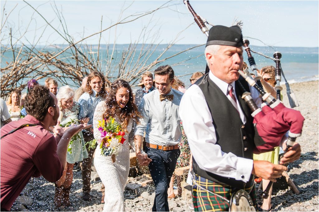 Bay of Fundy Nova Scotia DIY Beach Wedding, confetti exit photo with bag pipes